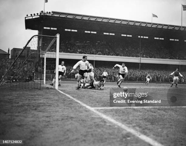 British footballer Jimmy Melia, Liverpool midfielder, British footballer Willie Stevenson, Liverpool midfielder, British footballer Tommy Lawrence ,...