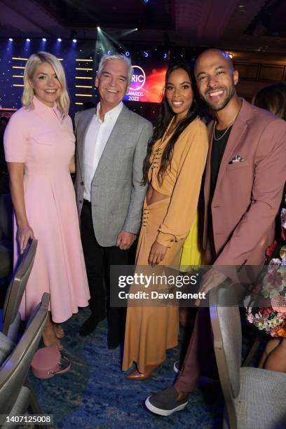 Holly Willoughby, Phillip Schofield, Rochelle Humes and Marvin Humes attend The TRIC Awards 2022 at The Grosvenor House Hotel on July 06, 2022 in...