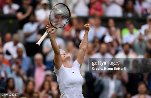 Simona Halep of Romania celebrates winning match point against Amanda Anisimova of The United States during their Women's Singles Quarter Final match...