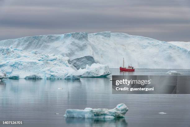 giant iceberg, disco bay, greenland - sea trawler stock pictures, royalty-free photos & images