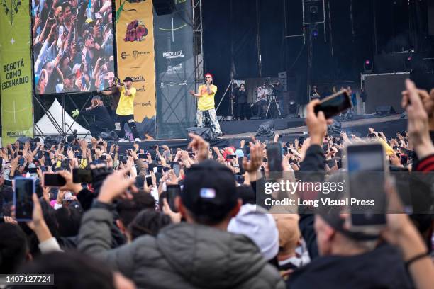 Fans and festival goers of 'Hip Hop Al Parque' rap festival enjoy themselves during the performance of MamboRap from Chile, on the first day of the...