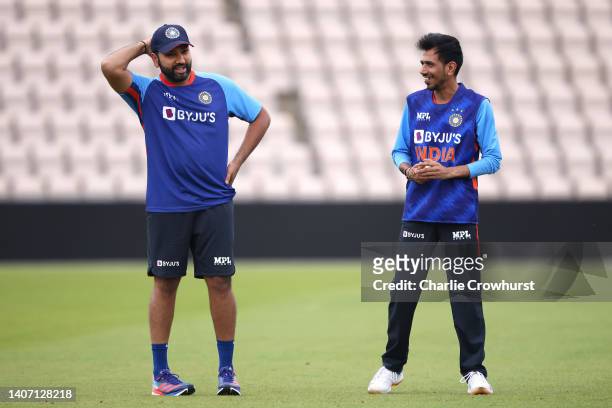 Yuzvendra Chahal chats with Captain Rohit Sharma of India during an Indian net session at Ageas Bowl on July 06, 2022 in Southampton, England.