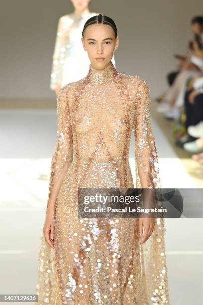 Model walks the runway during the Elie Saab Haute Couture Fall Winter 2022 2023 show as part of Paris Fashion Week on July 06, 2022 in Paris, France.