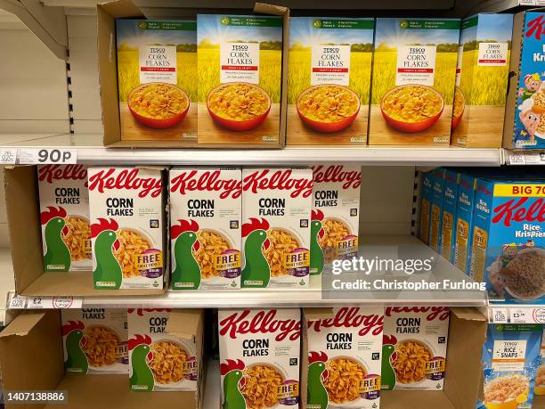 Kellogg's corn flakes sit on display in a Tesco supermarket on July 06, 2022 in Northwich, England. The British Retail Consortium recently said food...
