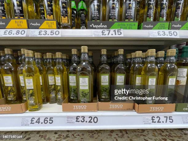 Olive oil sits on display in a Tesco supermarket on July 06, 2022 in Northwich, England. The British Retail Consortium recently said food...