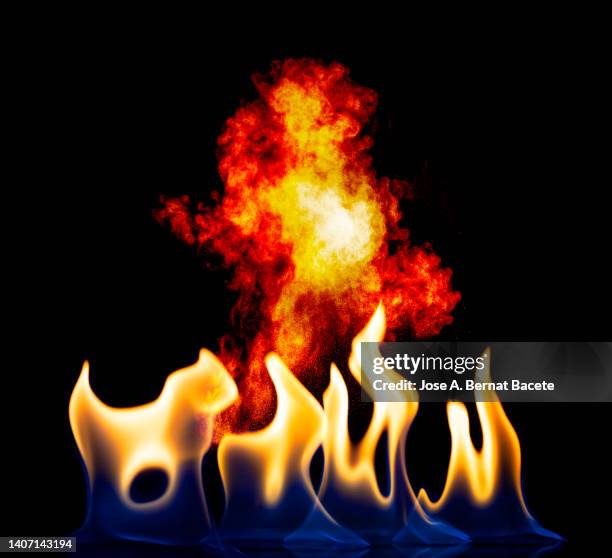 gas flame and fire explosion on a black background. - detonator stock pictures, royalty-free photos & images