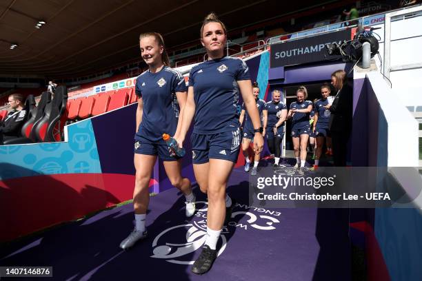 Abbie Magee of Northern Ireland takes to the field with teammates during the UEFA Women's Euro England 2022 Northern Ireland Training Session at St...