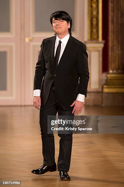 Russian designer Valentin Yudashkin walks the runway during the Valentin Yudashkin Ready-To-Wear Fall/Winter 2013 show as part of Paris Fashion Week...