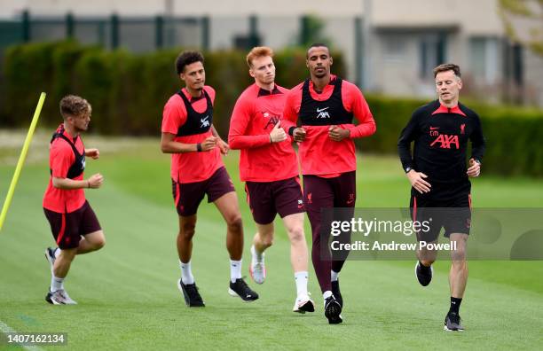 Harvey Elliott, Sepp van den Berg, Alex Oxlade-Chamberlain, Rhys Williams and Joel Matip of Liverpool during a pre-season training session at AXA...