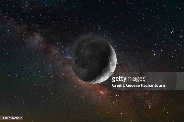 illuminated moon and the milky way - surface lunaire photos et images de collection