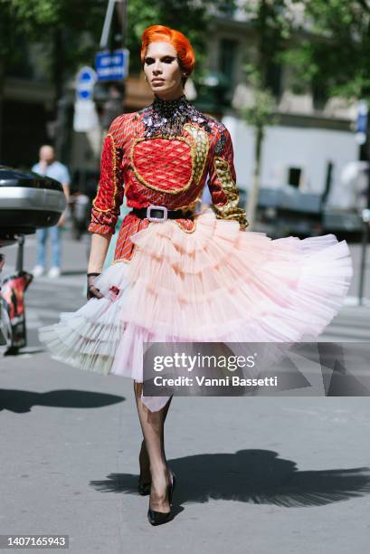 Miss Fame poses wearing Viktor and Rolf after the Viktor and Rolf show at the Pavillion Cambon during Paris Fashion Week Haute Couture Fall Winter...