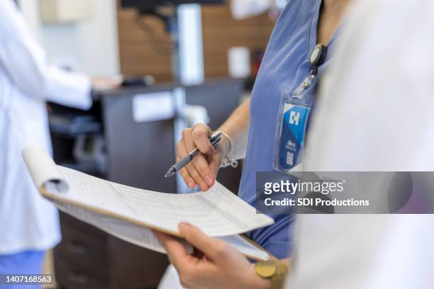 close up photo of paperwork - doctor chart stock pictures, royalty-free photos & images