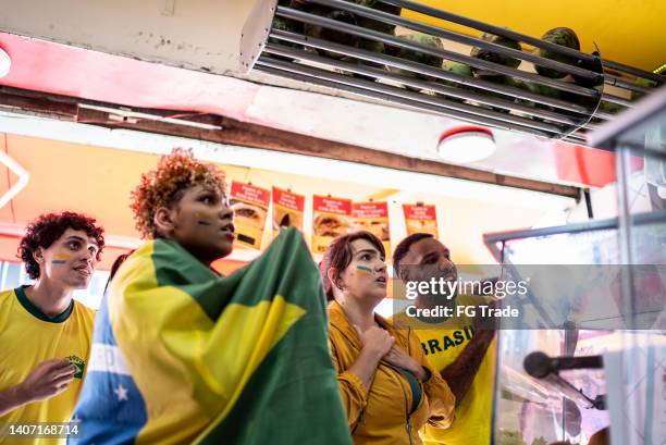 brazilian fans watching a soccer game - brazil football bildbanksfoton och bilder