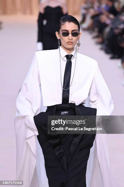 Model walks the runway during the Jean-Paul Gaultier Haute Couture Fall Winter 2022 2023 show as part of Paris Fashion Week on July 06, 2022 in...