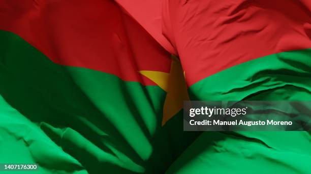 flag of burkina faso - burkina faso stock pictures, royalty-free photos & images