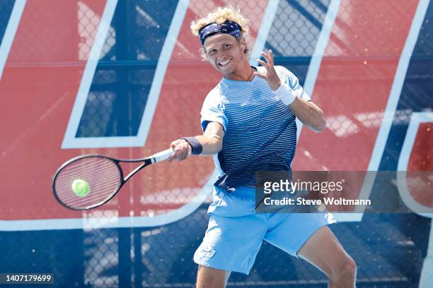August Holmgren of the San Diego Toreros returns during the Division I Men’s and Women’s Singles and Doubles Tennis Championship held at the Khan...
