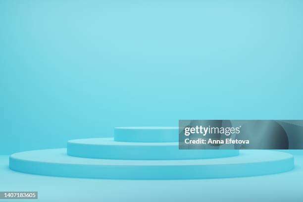 blue podium on beige background. - retail equipment stock pictures, royalty-free photos & images