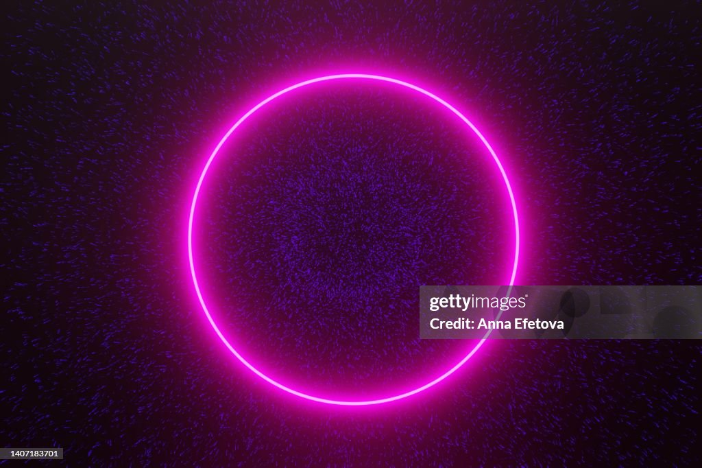 Magenta neon circle on glittering background with blue particles