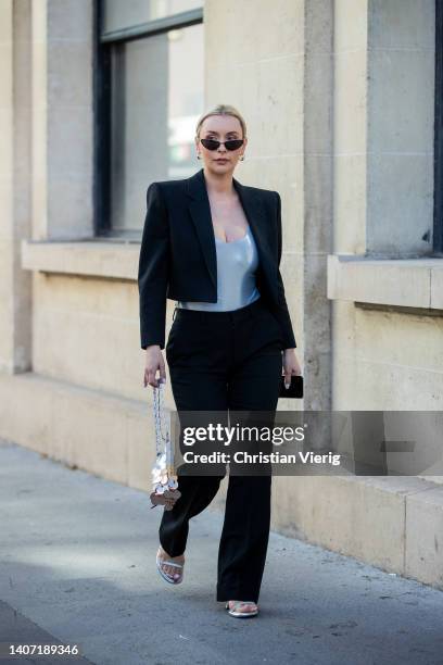 Justyna Czerniak seen wearing black cropped blazer, pants, Paco Rabanne bagoutside Alexandre Vauthier Paris Fashion Week - Haute Couture Fall Winter...