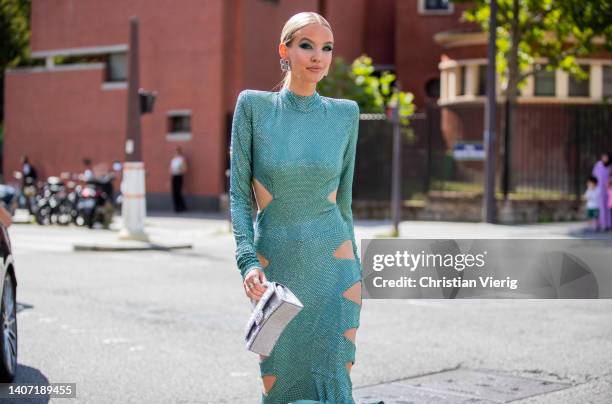 Leonie Hanne seen wearing silver Balenciaga bag, green cut out dress, heels, silver earrings outside Alexandre Vauthier Paris Fashion Week - Haute...