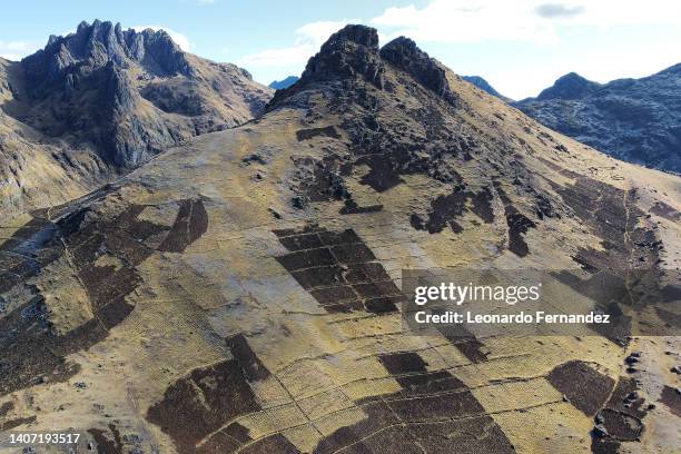 Aerial view of potato plots in the Peruvian Andes after harvest on June 22, 2022 in Pisac, Peru. The Potato Park is a unique seed bank located in the...