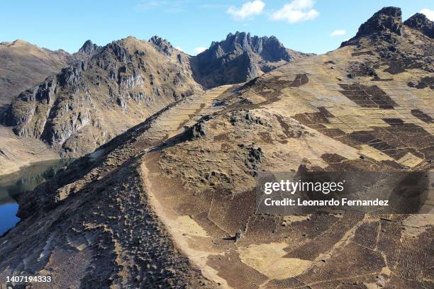 Aerial view of potato plots in the Peruvian Andes after harvest on June 22, 2022 in Pisac, Peru. The Potato Park is a unique seed bank located in the...