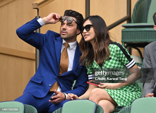 Dominic Cooper and Gemma Chan day 10 of the Wimbledon Tennis Championships at All England Lawn Tennis and Croquet Club on July 06, 2022 in London,...