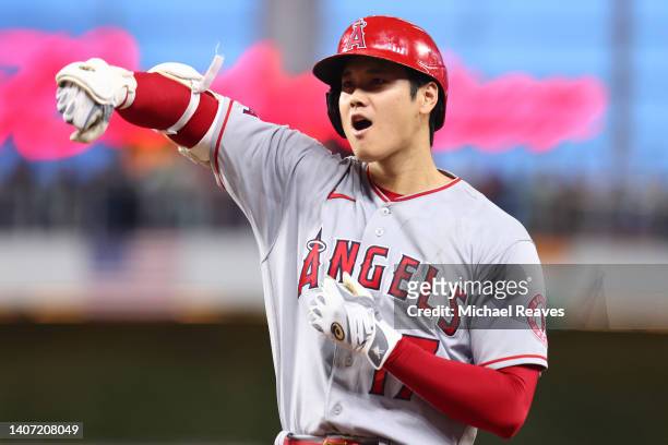 Shohei Ohtani of the Los Angeles Angels celebrates a two-RBI double against the Miami Marlins during the fifth inning at loanDepot park on July 06,...