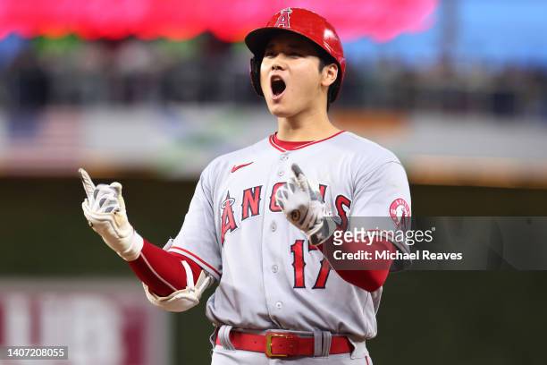 Shohei Ohtani of the Los Angeles Angels celebrates a two-RBI double against the Miami Marlins during the fifth inning at loanDepot park on July 06,...