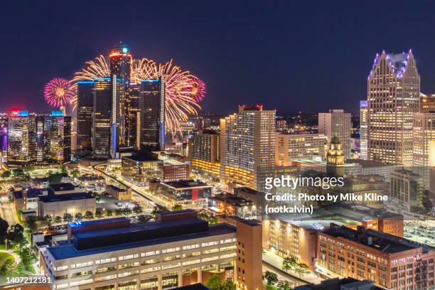 celebrating with fireworks in detroit michigan - detroit michigan fireworks stock pictures, royalty-free photos & images