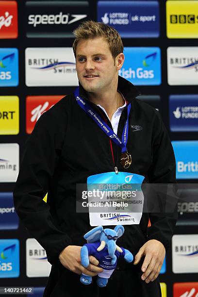 Liam Tancock of Loughborough University S & WPC wins the Gold medal in the Men's 100m Backstroke Final during day three of the British Gas Swimming...