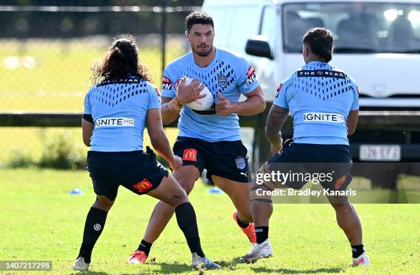 Jordan McLean takes on the defence during a New South Wales Blues State of Origin training session at Cudgen Leagues Club on July 07, 2022 in...