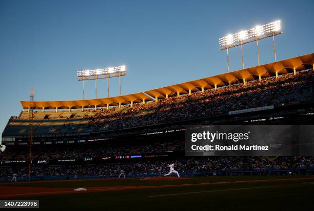 Mitch White of the Los Angeles Dodgers throws against the Colorado Rockies in the third inning at Dodger Stadium on July 06, 2022 in Los Angeles,...