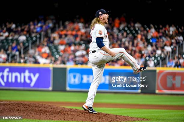 Ryne Stanek of the Houston Astros reacts after getting a strikeout in the eighth inning against the Kansas City Royals at Minute Maid Park on July...