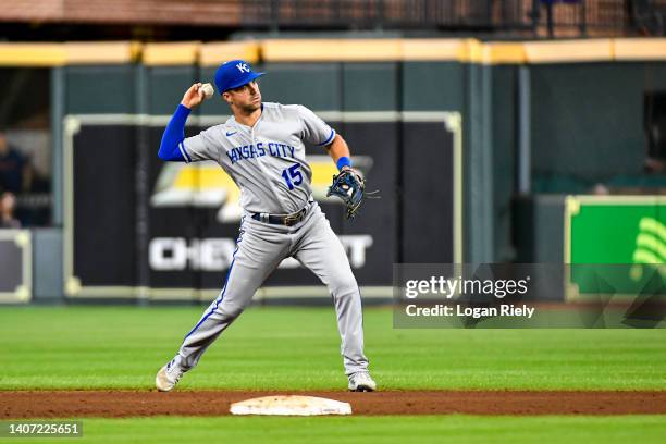 Whit Merrifield of the Kansas City Royals throws after fielding a ball in the seventh inning against the Houston Astros at Minute Maid Park on July...