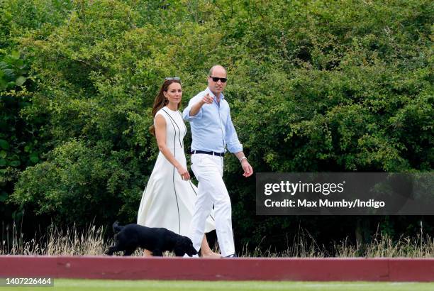 Catherine, Duchess of Cambridge and Prince William, Duke of Cambridge, with their dog 'Orla', attend the Out-Sourcing Inc. Royal Charity Polo Cup at...