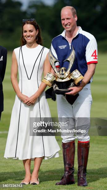 Catherine, Duchess of Cambridge and Prince William, Duke of Cambridge attend the Out-Sourcing Inc. Royal Charity Polo Cup at Guards Polo Club,...