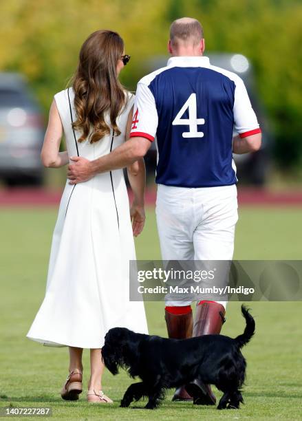 Catherine, Duchess of Cambridge and Prince William, Duke of Cambridge, with their dog 'Orla', attend the Out-Sourcing Inc. Royal Charity Polo Cup at...