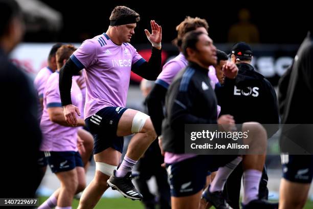 Scott Barrett warms up during a New Zealand All Blacks training session at Forsyth Barr Stadium on July 07, 2022 in Dunedin, New Zealand.