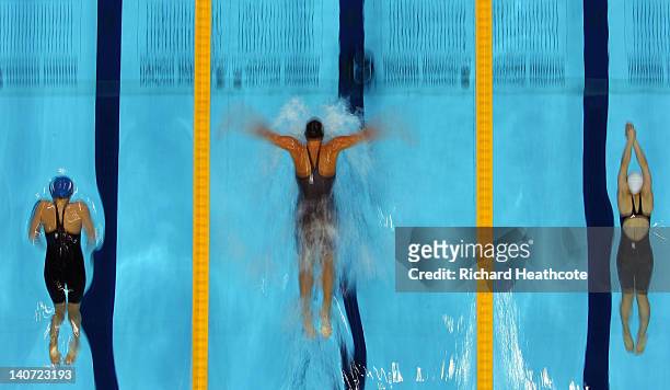 Barbora Zavadova of Czech Republic, Kathryn Meaklim of Russia and Seoyeong Kim of Korea compete in the Women's 200m Individual Medley Guest Final...