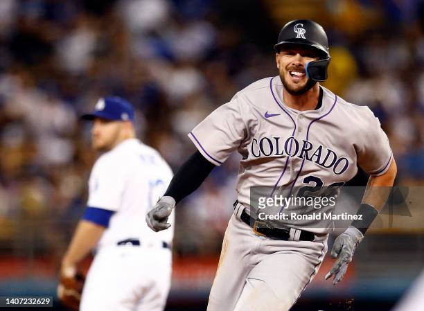 Kris Bryant of the Colorado Rockies scores a run against the Los Angeles Dodgers in the sixth inning at Dodger Stadium on July 06, 2022 in Los...
