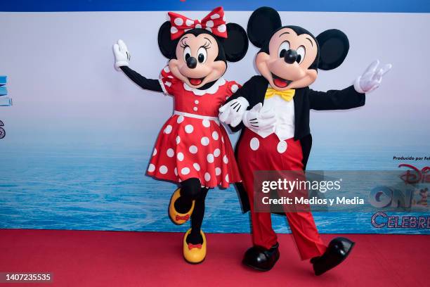 Minnie Mouse and Mickey Mouse pose for a photo during the red carpet for the premiere of "Disney On Ice" at Auditorio Nacional on July 6, 2022 in...