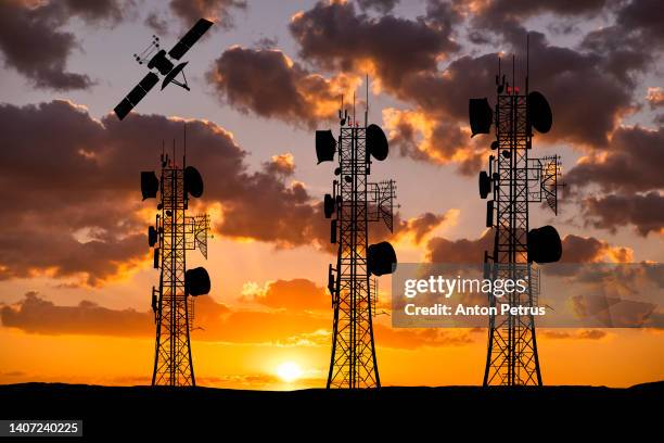 communication tower and satellite at sunset. satellite communication concept - satellite dish photos et images de collection