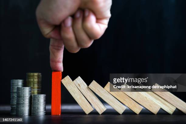 money concept,insurance concept,domino,wooden block,business risk, strategy and planing concept idea. - accident constant ストックフォトと画像
