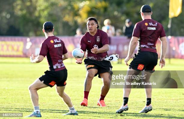 Josh Papalii passes the ball during a Queensland Maroons State of Origin training session at Sanctuary Cove on July 07, 2022 in Gold Coast, Australia.