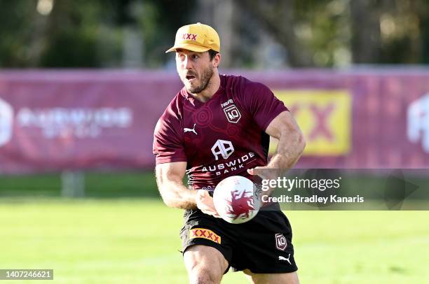 Ben Hunt passes the ball during a Queensland Maroons State of Origin training session at Sanctuary Cove on July 07, 2022 in Gold Coast, Australia.