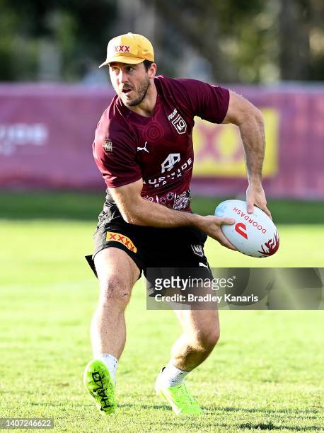 Ben Hunt passes the ball during a Queensland Maroons State of Origin training session at Sanctuary Cove on July 07, 2022 in Gold Coast, Australia.