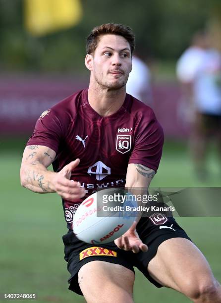 Kalyn Ponga passes the ball during a Queensland Maroons State of Origin training session at Sanctuary Cove on July 07, 2022 in Gold Coast, Australia.