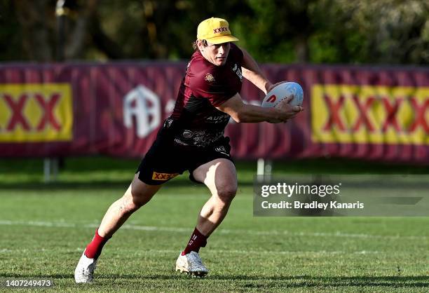 Harry Grant runs with the ball during a Queensland Maroons State of Origin training session at Sanctuary Cove on July 07, 2022 in Gold Coast,...