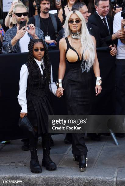 North West and Kim Kardashian attend the Jean Paul Gaultier Couture Fall Winter 2022 2023 show as part of Paris Fashion Week on July 06, 2022 in...